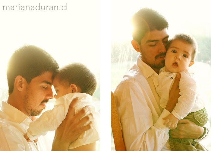 Padre con su hijo en brazos al atardecer